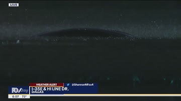 Drivers stranded on flooded streets in Downtown Dallas