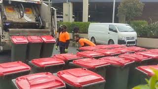 Rear Loader Garbage Truck Crew in Action