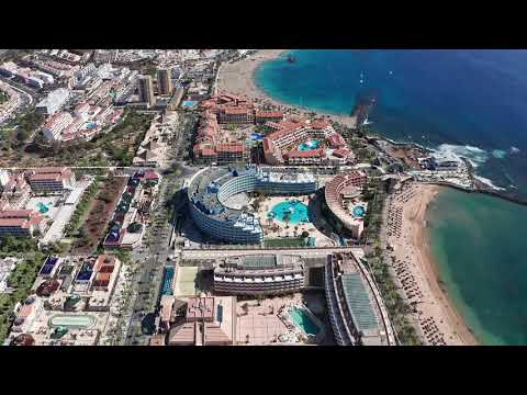 Playa de Las Americas is a resort in the south of Tenerife, Spain. Drone view and walk in November.