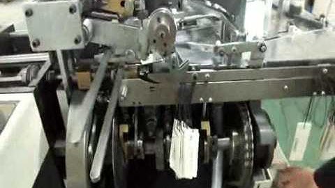 Automatic Pouching & Threading Machine