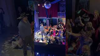 Girl's Stage Mishap at a Bachelor Community Auction