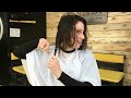 Girl having fun cutting her long hair short in the salon (HD remaster)