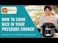 Twosleevers making rice in the pressure cooker