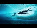 The Untold Story of Todd Glaser's Brilliant Underwater Photo of Kelly Slater and John Florence