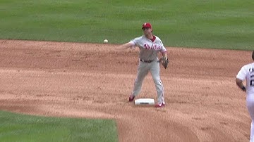 Rollins starts a double play in the first