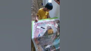 Chàng trai 10 tuổi Tự tay đính đá bức tranh lớn nhất thế.