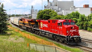 SUPER RARE! CPKC new paint AC44CWM leader! CP 8119 leads CP mix freight train Northbound at Calgary.