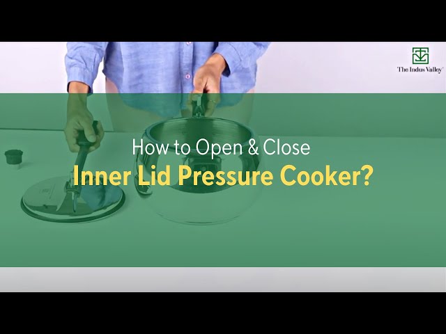 How to Open and Close the Lid of your Zavor Pressure Cooker  To open the  lid, pull back on the lock on the top handle and turn the lid  counterclockwise until