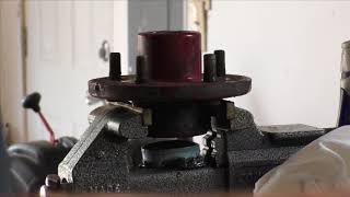 how to install a wheel bearing and grease seal in a trailer hub