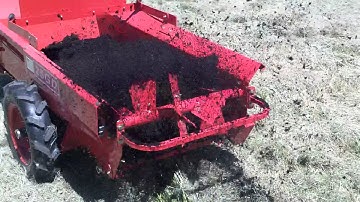 Manure spreader in use