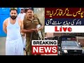 Robber Ubaid Dogar entering Sargodha Market by taking off his shirt along with the Police