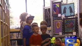 Local elementary school students show off their art work