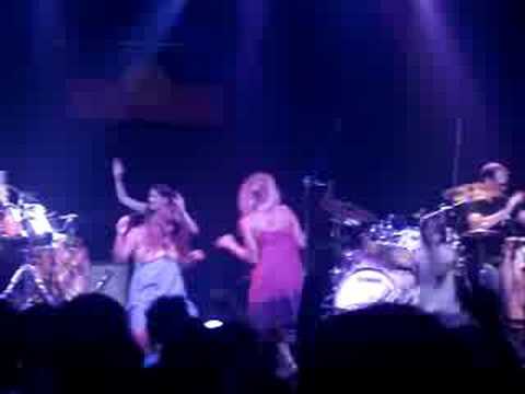 Girls rush the stage during Let Me Be at Xavier Rudd