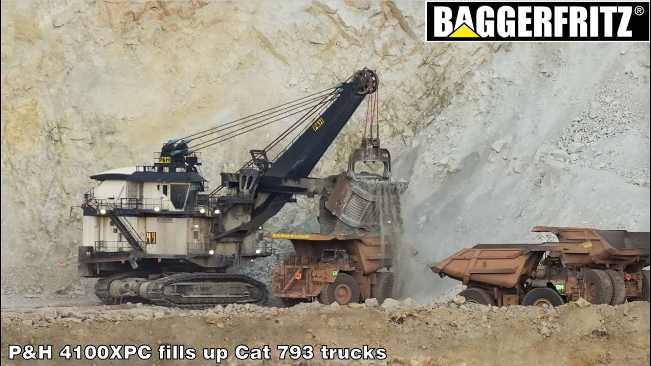 MASSIVE P&H 4100XPC shovel loads a fleet of Cat 793 trucks at