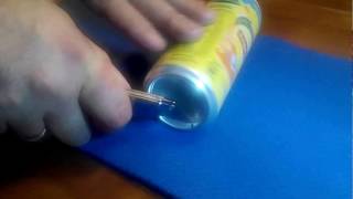 The best way to cut the bottom of a soda can.