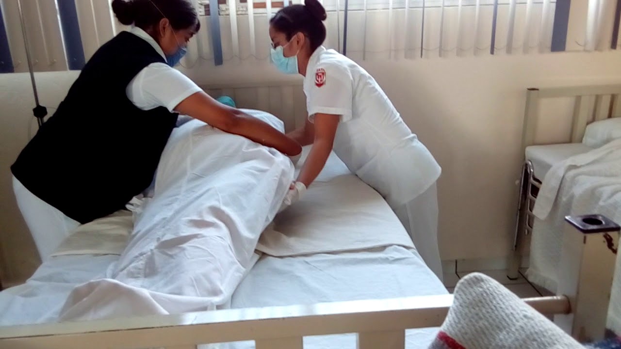 Tendido de cama ocupada (con paciente). - YouTube