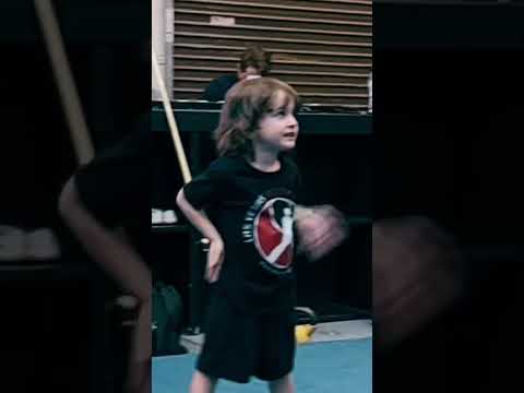 Little kids take Kung fu class