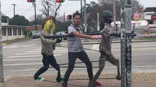 Man street dancing in Austin 2017 with puppets.MOV