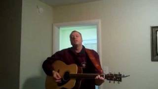 Holding her and loving you  Earl Thomas Conley