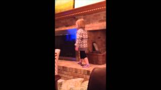 Flissy Sings On Fireplace