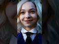 The wink of Emma Myers playing Enid Sinclair