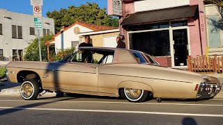 Lowriders having a good time in Wilmington Ca.