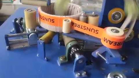 Semi-auto horizontal coil wrapping machine