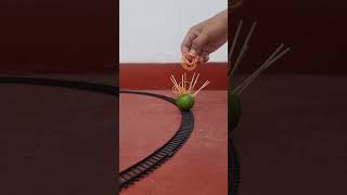 Green orange and toothpick and Rubber Bands hit the train  #shorts #satisfying India #1MfromIndia