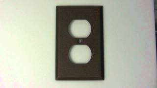 Textured bronze two plug switch plate cover