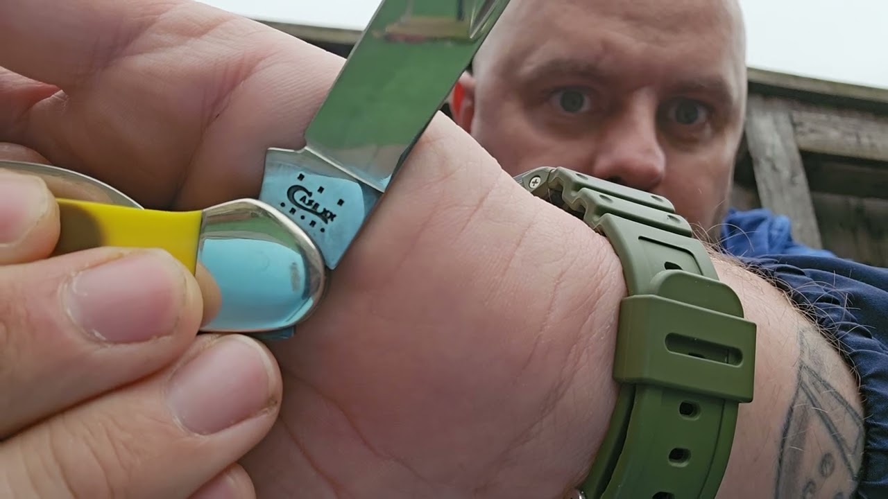 Case canoe John Deere pocket knife 