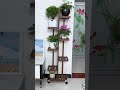 The Multi Layer Solid Wood Flower Stand With Wheels Looks So Beautiful At Home Flowerstand