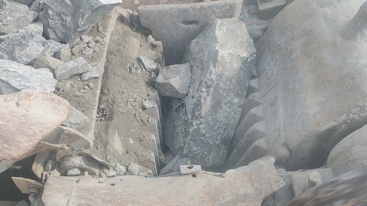 Raw Power of Heavy Machinery in Black Stone Quarry: Breaking Stone With Jaw Machine