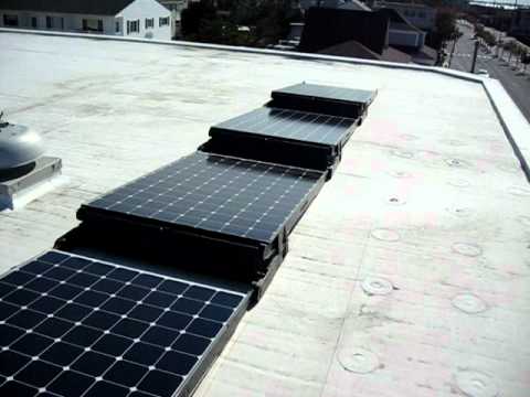 First row of SunPower 310 Solar Panels on the roof - YouTube