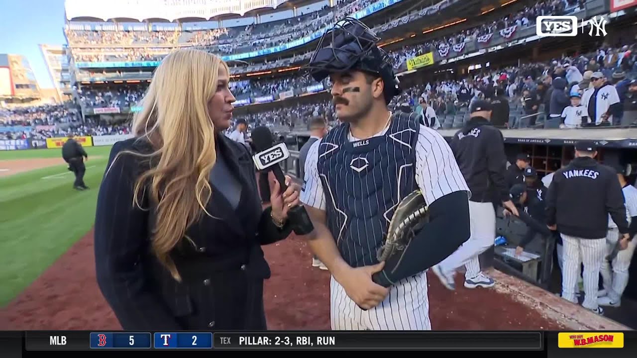 Austin Wells with Meredith on Opening Day win