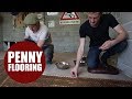 Son and dad have used 33,000 coins, glue and Coca-Cola to remodel their garage floor