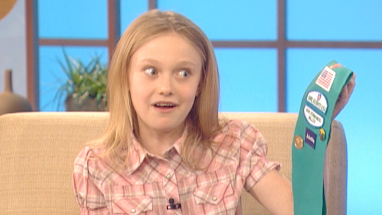 Ellen Helps Dakota Fanning Get a Girl Scout Patch