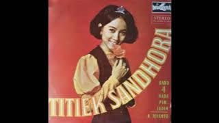 titiek sandora 