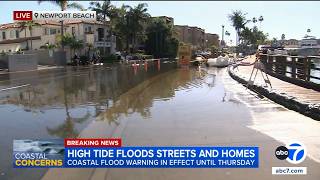 Another day of high tides flood Newport Beach streets