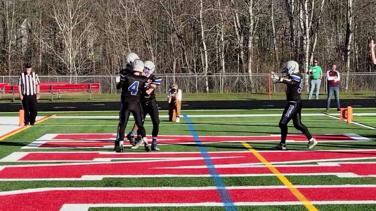 Brady Plante scores on a six yard keeper for OOB in the 8-man small school state championship game