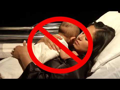 Video: How To Lay A Baby
