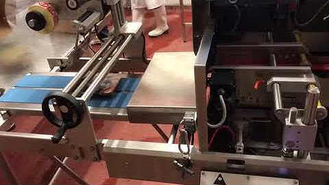 Shaped Slideable Linerless Sleeve Application to Sausage Packs