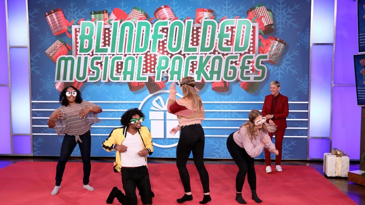 Fans Dance It Out During 'Blindfolded Musical Packages'