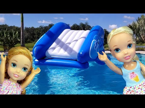 Water Slide ! Elsa and Anna toddlers - pool playdate - Barbie - floaties - swim - water fun - splash