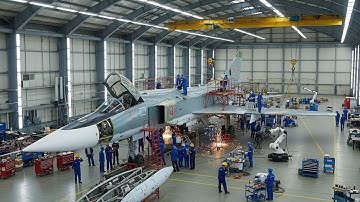 Inside a secret factory, the production and assembly of modern SU - 22 fighter jets are taking place