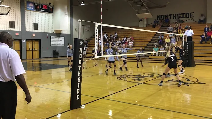 Volleyball: Kathleen Slade's serve, Savannah Slade...