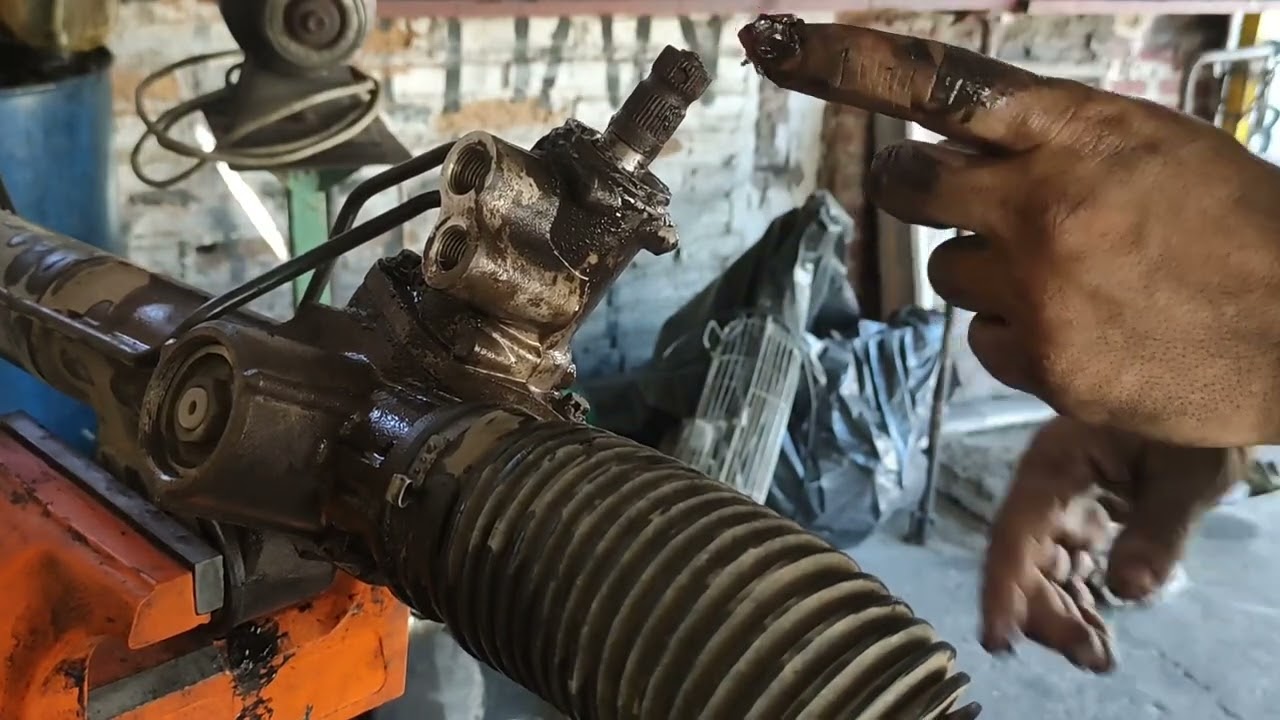 reparación de cremallera Nissan np300 corrección de fuga por reten superior