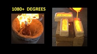 MOLTEN COPPER INTO CLAY MOLDS MELTING COPPER AND POURING INTO CLAY MOLDS