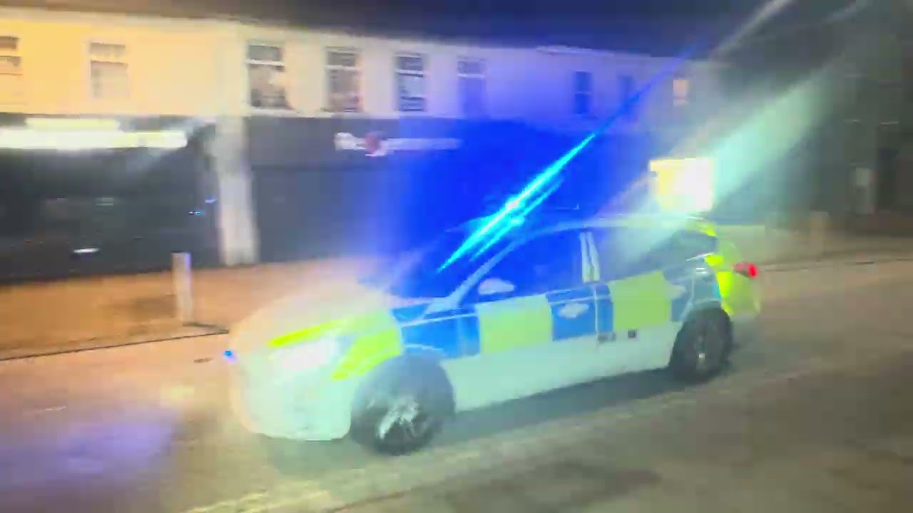 Gwent polices ford focus driving through Ebbw vale town with a light and sirens  demonstration 