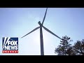 Texas wind turbines frozen, contributing to rolling blackouts