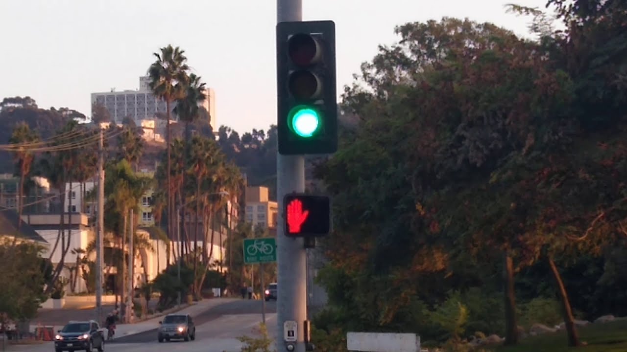Malfunctioning Neon Pedestrian Signal (Fashion Valley Rd & Riverwalk Dr)
